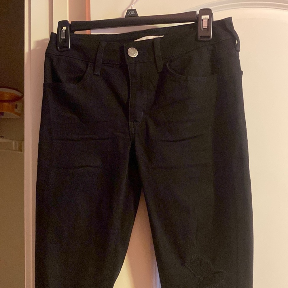 SO low rise women’s black jeans. minimal holes. Size 5/27 W.